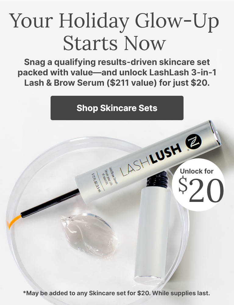Holiday skincare promotion featuring LashLash 3-in-1 Lash & Brow Serum on a clear dish with gel, highlighting limited-time $15 offer ($114 value) when purchased with qualifying skincare sets.